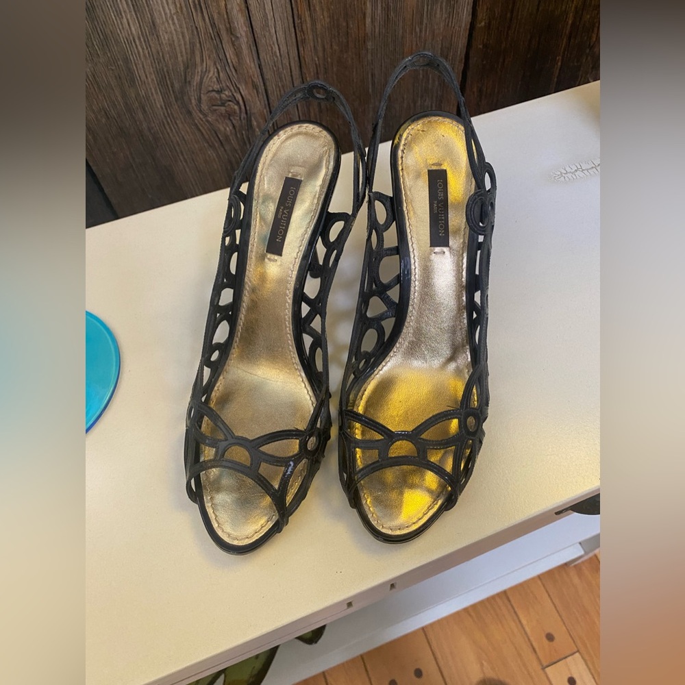 Louis Vuitton black heels pre owned. Size 7.5
